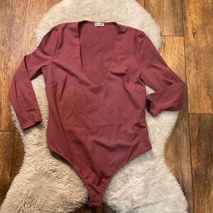 Free People Deep V Long Sleeve Bodysuit in Dusty Rose